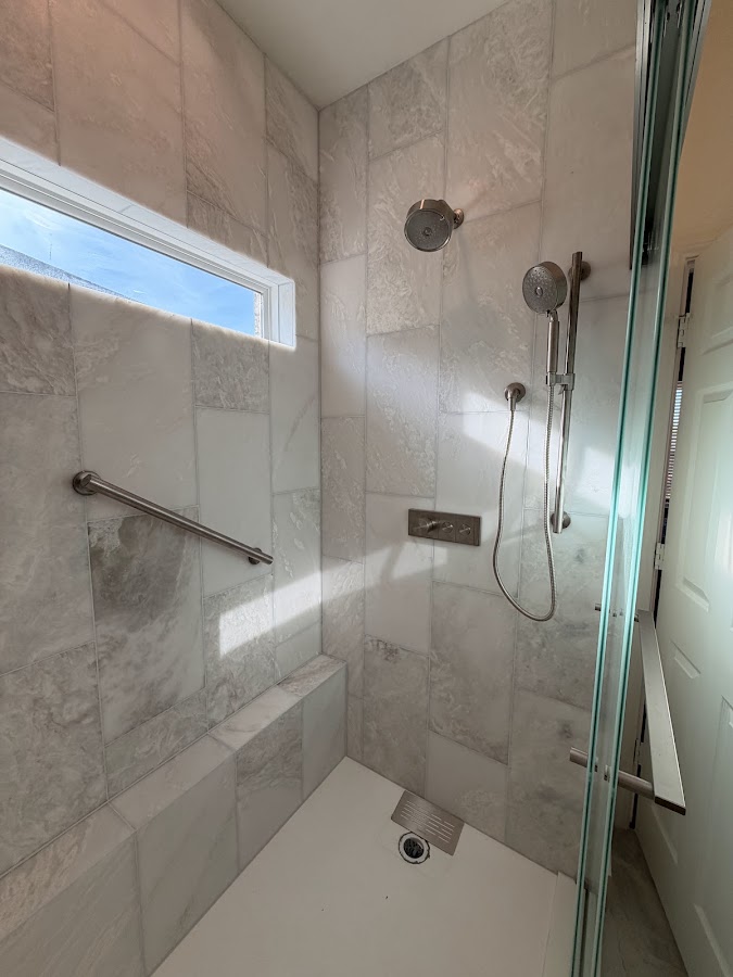 Tiled walk-in shower renovation by All Sweet Home LLC